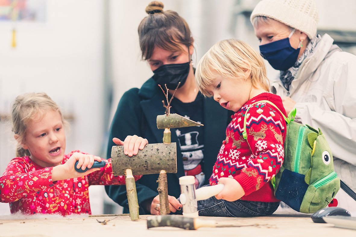 Family enjoys reindeer workshop