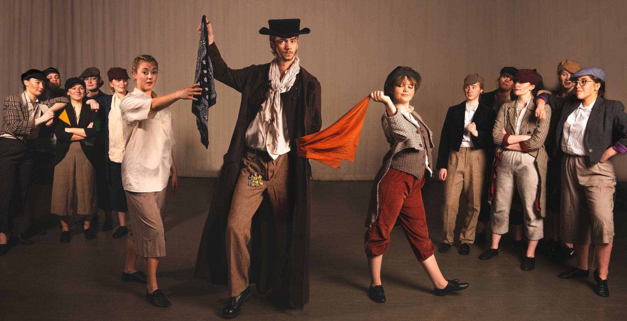 The cast of Oliver on stage at Burnley College