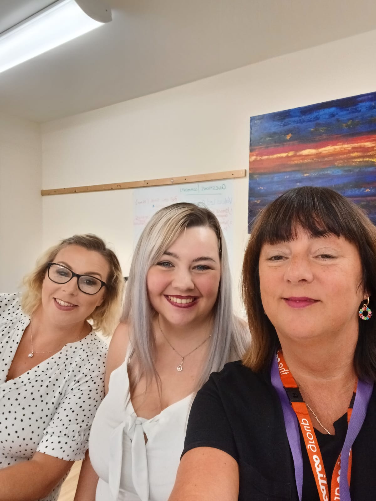 Tegan Mulby (centre) gets ready to address an online delegation at a conference in the USA