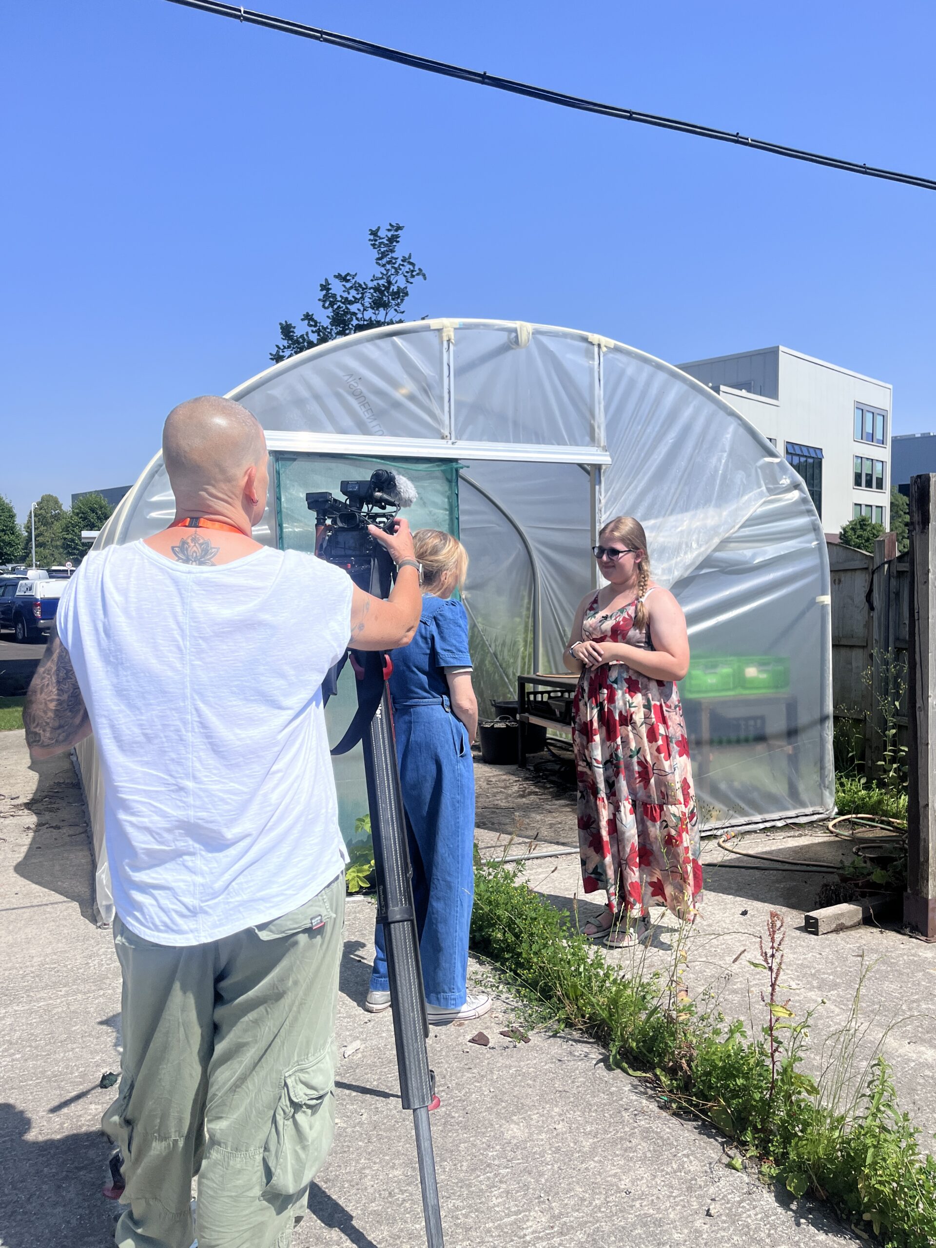 20260626_103807715_iOS A student being interviewed by a poly tunnel